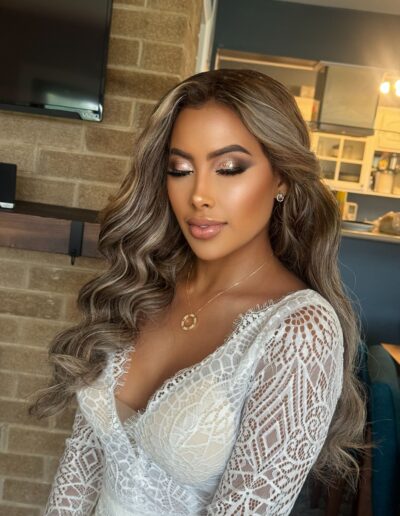 Bridal updo hairstyle with glowing glam makeup – Glam by Duaa