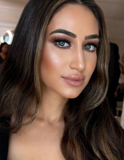 Bride with dramatic eye makeup and voluminous updo – Glam by Duaa