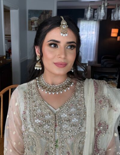 Traditional bridal look with dupatta and jewelry setting – Glam by Duaa